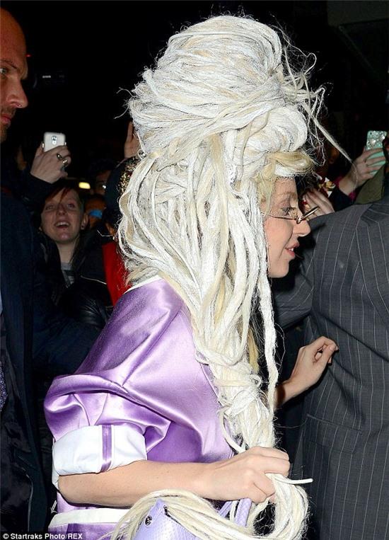 That looks heavy: The five-time Grammy winner also wore a straight blonde wig beaneath her white tangled creation 