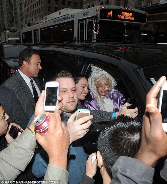 Say Koons! She made sure to pose for photographs with her Little Monsters before leaving her Midtown Manhattan hotel