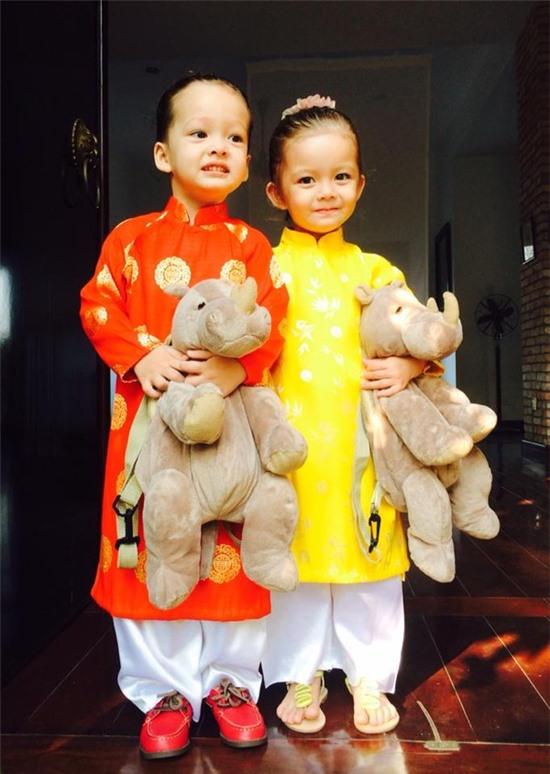 Ngắm các nhóc tì nhà sao Việt xúng xính diện áo dài đón Tết 1