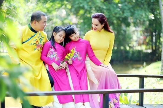 Ngắm các nhóc tì nhà sao Việt xúng xính diện áo dài đón Tết 14