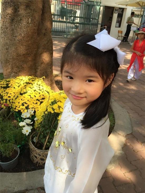 Ngắm các nhóc tì nhà sao Việt xúng xính diện áo dài đón Tết 16