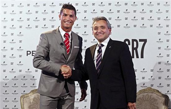 Cristiano Ronaldo (left) poses with Dionisio Pestana, owner of the Pestana Hotel Group