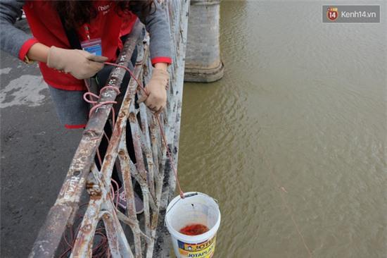 Sông hồ Hà Nội sạch bóng túi rác thải ngày tiễn ông Táo lên trời - Ảnh 7.