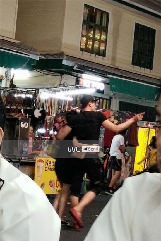 Hoàng Thùy Linh - Vĩnh Thụy diện đồ đôi, ôm nhau tình tứ ở Thái Lan - Ảnh 1.