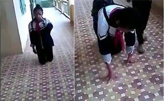 Hình ảnh nữ sinh bị bạn học ép phải quỳ gối, bò dọc hành lang trong clip được chia sẻ trên mạng
