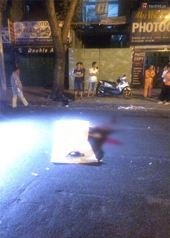 TP. HCM: Lao ra đường tự tử, nam thanh niên bị xe rác cán tử vong - Ảnh 1.