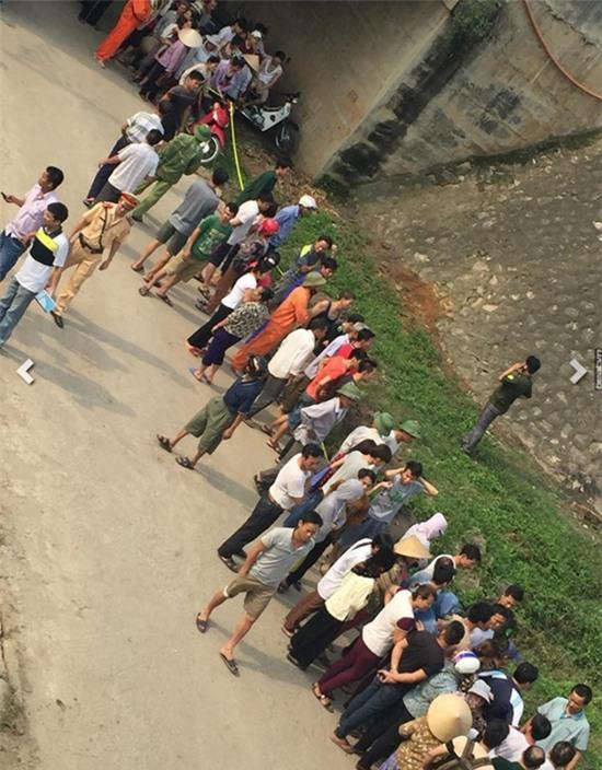 Hà Nội: Nam thanh niên bị đánh chết, vứt xác dưới chân cầu chui đại lộ Thăng Long - Ảnh 2.