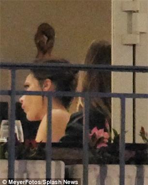 Stunner: She looked naturally beautiful as she was pictured at the table