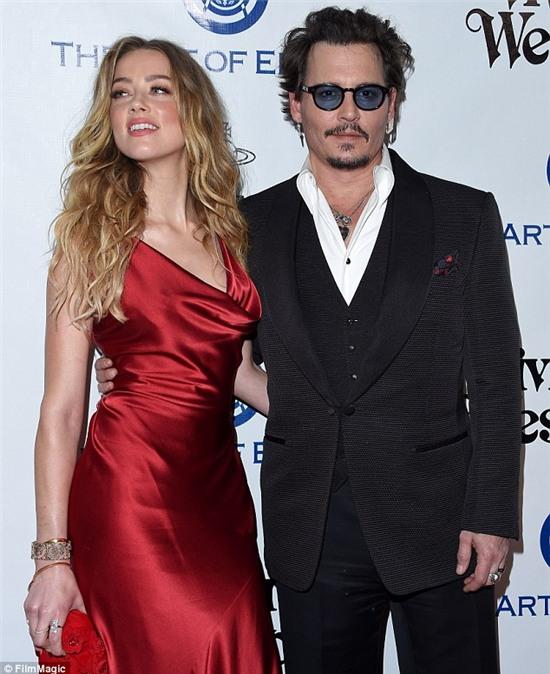 Amber Heard tung ảnh bầm mắt, tố Johnny Depp bạo hành mình - Ảnh 5.
