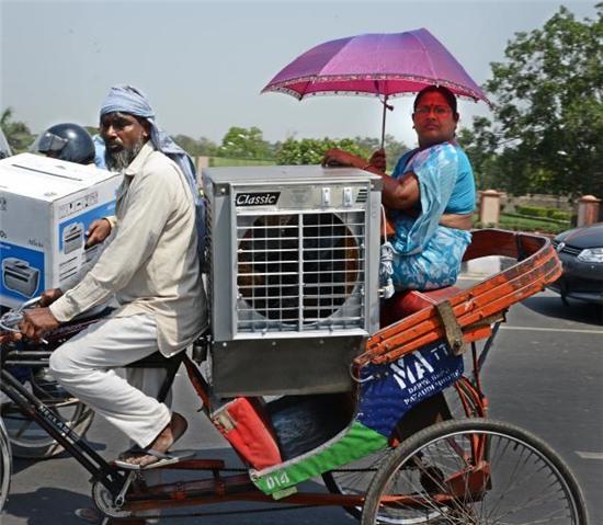 Chùm ảnh: Những hình ảnh nắng nóng khủng khiếp chỉ có ở Ấn Độ - Ảnh 9.