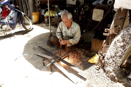 Ảnh: Người lao động quay cuồng trong “chảo lửa” Hà Nội - 8