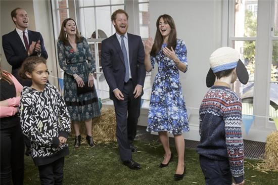 Kate and Prince Harry laughed along with Prince William when the group played a game with kids in October 2015.