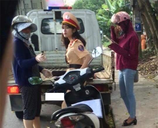 Bị ném đá vì một bức ảnh chụp lén, nữ CSGT xinh xắn này buộc phải khóa trang cá nhân - Ảnh 2.