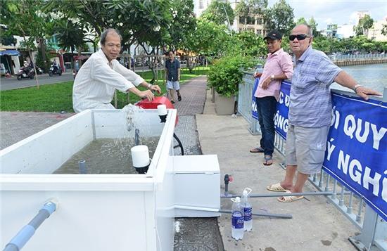 đạp xe, lọc nước, bờ Kênh Nhiêu Lộc - Thị Nghè, Sài Gòn, ô nhiễm