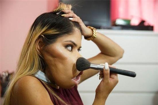 Marimar-Quiroa-pictured-putting-her-make-up-as-she-records-videos-for-YouTube (1).jpg