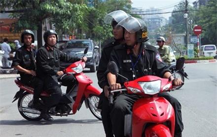 Từ 2/9: Cảnh sát cơ động không được dừng xe vi phạm mũ bảo hiểm - Ảnh 1.