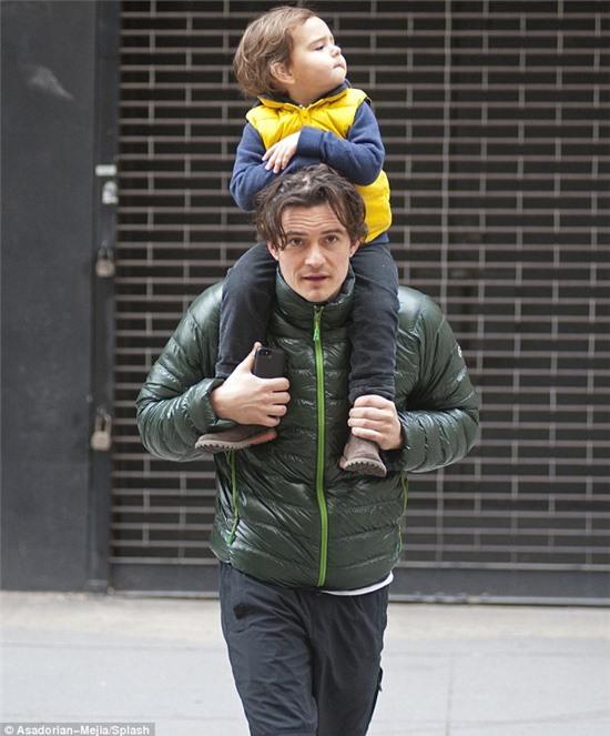 So cute: The 36-year-old actor hoisted his mini-me up on his shoulders as they took a stroll around the Soho area