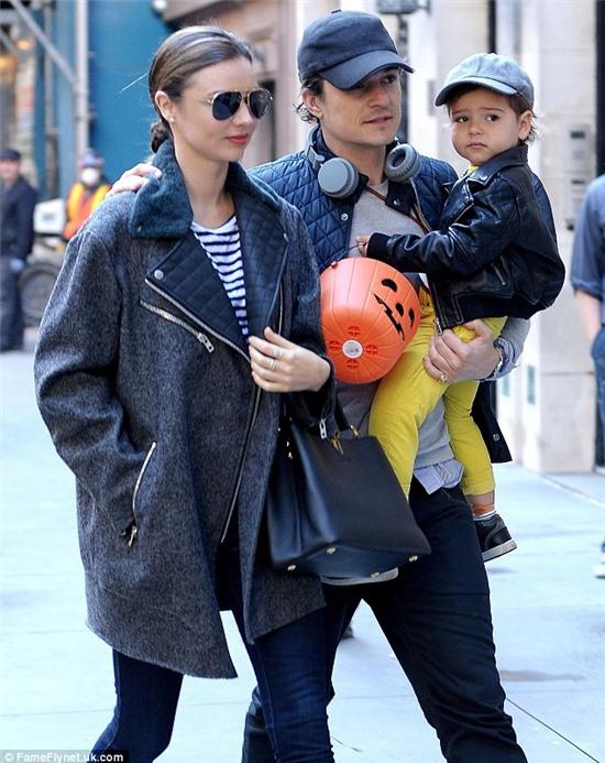 Show of unity: Just days after announcing their split, Miranda and Orlando were often pictured out and about together with Flynn, putting on a show of unity