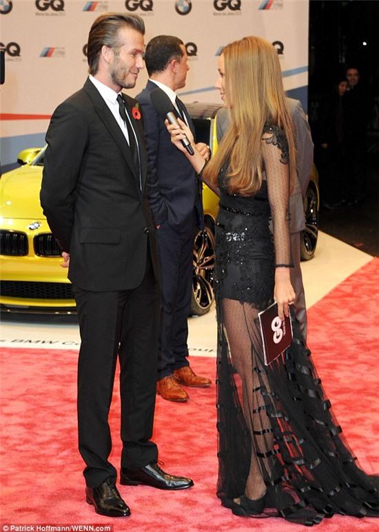 He's got company: David Beckham chats to Annemarie Warnkross on the red carpet ahead of the main event on Thursday evening