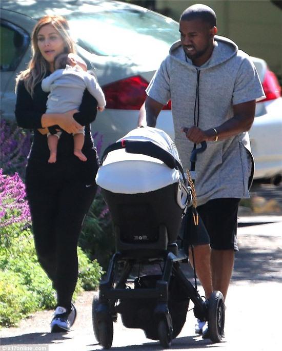 Sleeping beauty: The four-month-old tot slept while resting on her mother's shoulder on the way to lunch