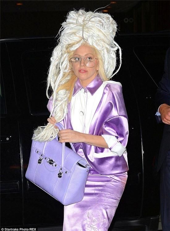 Bird's nest: Lady Gaga headed to rehearsals for her third SNL stint in a towering dreadlock wig and collared lavender dress in New York Monday