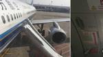 Một người Trung Quốc mở cửa thoát hiểm máy bay vì tưởng toilet