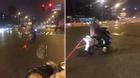 Người đàn ông buộc cổ mèo vào xe máy kéo lê khắp phố gây bức xúc