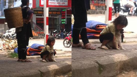 Xúc động em bé dân tộc ôm hôn chú chó nhỏ trước khi bị đem bán