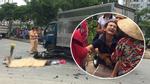Vợ gào khóc bên thi thể chồng bị xe tải cán ở Sài Gòn