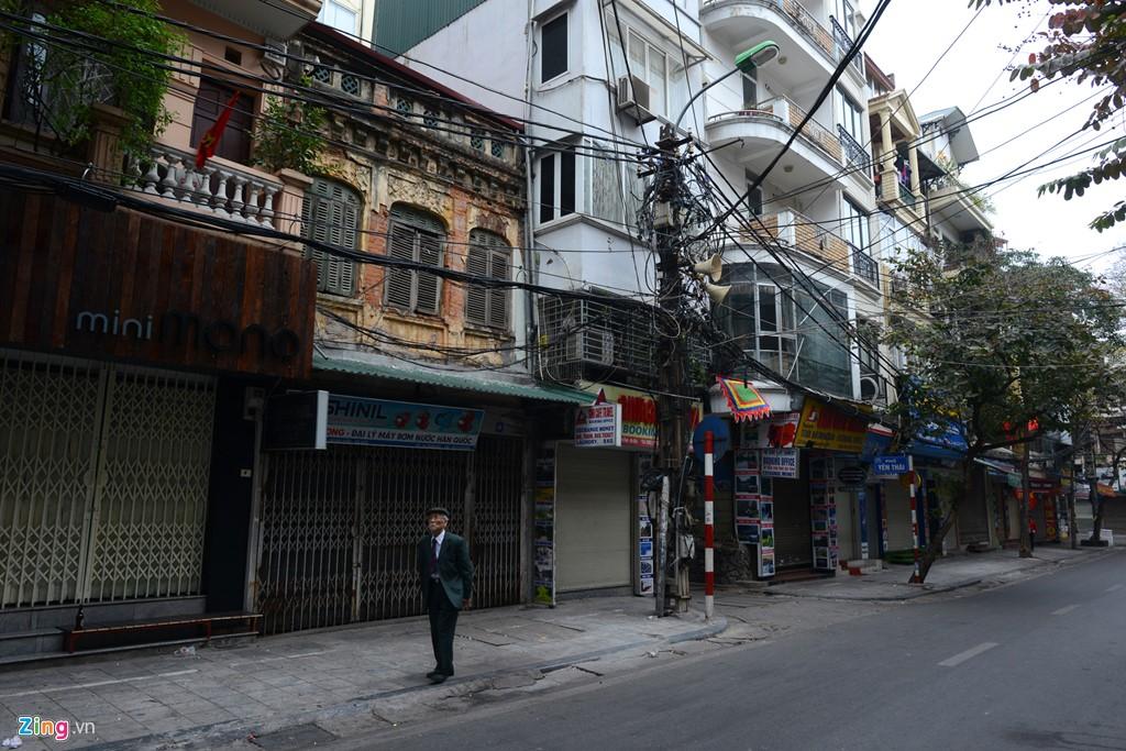 Ha Noi vang lang sang mung 1 Tet hinh anh 6