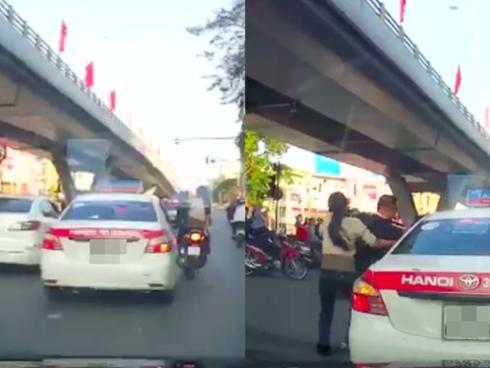 Người đàn ông chạy SH chặn xe taxi, dọa đánh tài xế vì không được tạt đầu