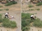 Cô gái trẻ quằn quại đòi nhảy sông tự tử ở vùng nước ngập chưa đến đầu gối