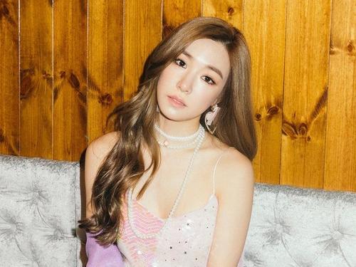 Giữa tin đồn SNSD tan rã, Tiffany quyết định ký tiếp hợp đồng với SM