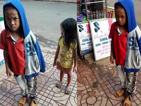 Hình ảnh bé trai bị xích chân giữa chợ khiến nhiều người bức xúc