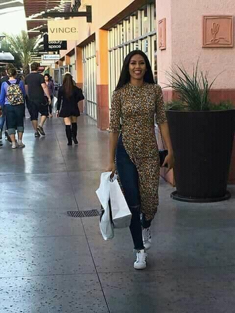 Đi Mỹ thi Miss Universe mà Nguyễn Thị Loan lại mặc áo dài với jeans rách và váy thì sến không tưởng-2