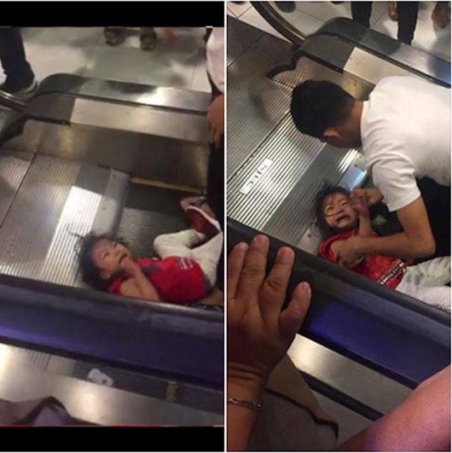 Bé gái bị kẹt tóc ở thang cuốn gào khóc thảm thiết khiến ai xem cũng rùng mình-1