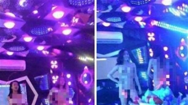 Nữ tiếp viên quán karaoke khỏa thân, tắm bia mua vui cho khách-1