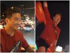 Đàm Vĩnh Hưng mặc quần short, nhảy lên nóc xe ăn mừng chiến thắng của U23 Việt Nam