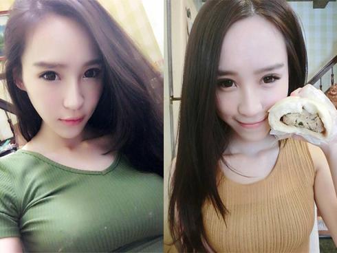 Cô gái xinh đẹp với vòng 1 nảy nở đứng bán bánh bao thu hút khách hàng