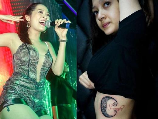 Hình xăm ở vùng eo của Bảo Anh là hình một cậu bé cuộn mình trong một nửa vòng tròn, và kèm dòng chữ Successful.