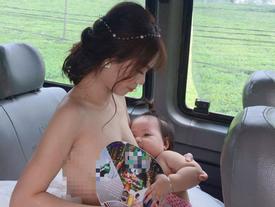 Ngồi vén váy cho con bú trên xe, cô dâu xinh đẹp gây xôn xao dân mạng Ngồi vén váy cho con bú trên xe, cô dâu xinh đẹp gây xôn xao dân mạng