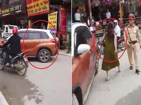 Clip: Bị CSGT nhắc nhở, nữ tài xế đỗ ô tô giữa đường chống đối
