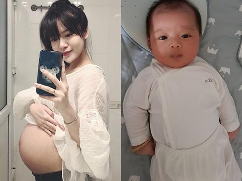 Tròn 4 tháng ở cữ nuôi con, hotgirl Tú Linh tái xuất rạng rỡ như em chưa 18 trong bộ ảnh áo dài thướt tha-12