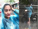 Tranh thủ chụp ảnh trong cơn mưa hiếm hoi của Hà Nội, cô gái bỗng dưng hot nhất hôm nay