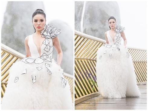 Dù có lúc suýt ngã nhưng Kỳ Duyên vẫn catwalk đầy chuyên nghiệp trong mưa gió tầm tã