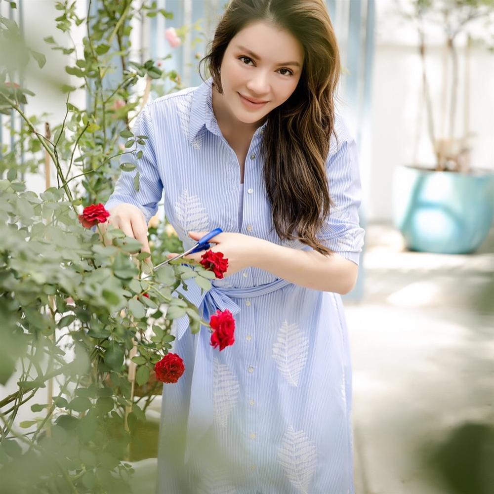 Hoa hậu Thu Thảo thon gọn như thời con gái sau 4 tháng sinh con-7