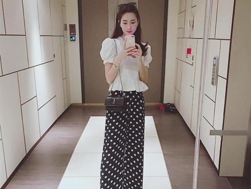 Hoa hậu Thu Thảo thon gọn như thời con gái sau 4 tháng sinh con