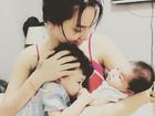 Ca sĩ Hải Băng hạnh phúc với hình ảnh bà mẹ bỉm sữa một nách hai con