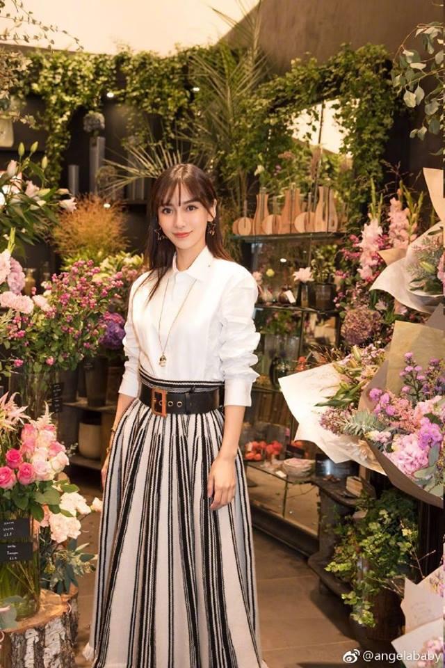 Huỳnh Hiểu Minh - Angela Baby che kín quý tử trước ống kính phóng viên-10