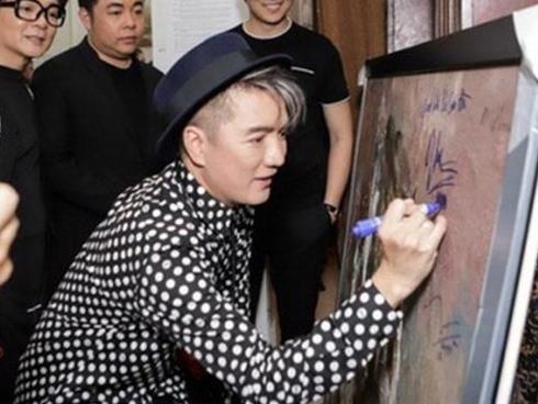 Tại sao Đàm Vĩnh Hưng bị chỉ trích dữ dội khi ký lên tranh?